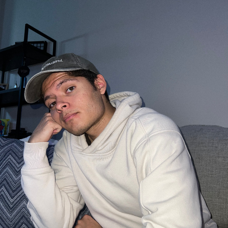 Eddie with hand on face